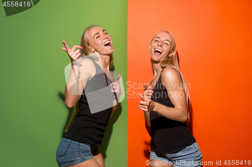 Image of The happy business women standing and smiling