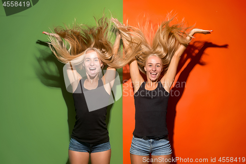 Image of The happy business women standing and smiling