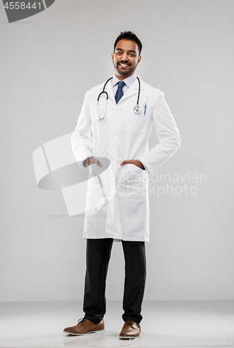 Image of smiling indian male doctor with stethoscope
