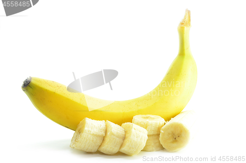 Image of Ripe yellow banana with sliced bananas