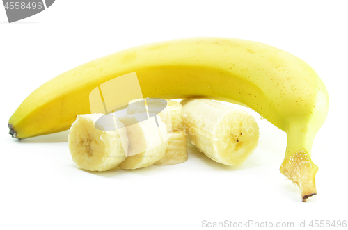 Image of Ripe yellow banana with sliced bananas