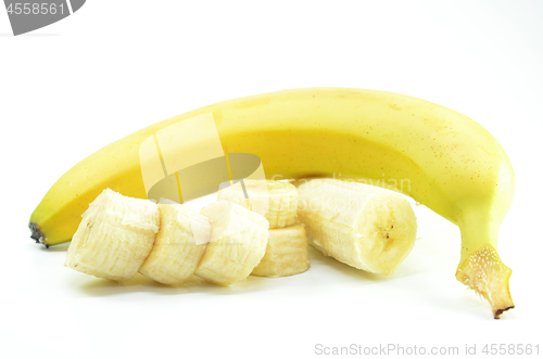 Image of Ripe yellow banana with sliced bananas