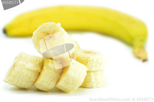 Image of Ripe yellow banana with sliced bananas