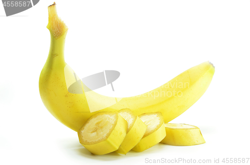 Image of Ripe yellow banana with sliced bananas