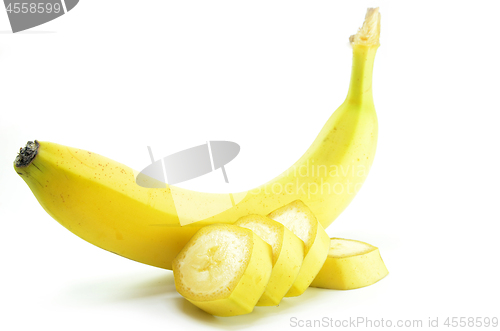 Image of Ripe yellow banana with sliced bananas