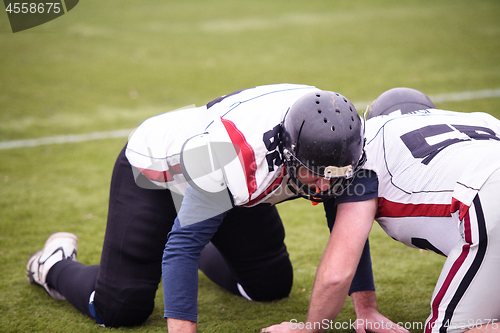 Image of professional american football players training