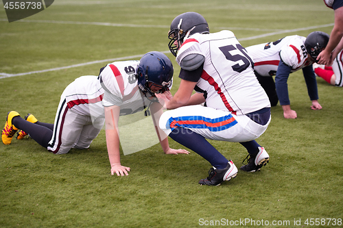 Image of professional american football players training