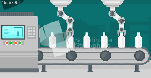 Image of Robotic arm working on conveyor belt with bottles.