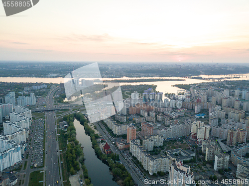 Image of Aerial view city Kiev and the Dnieper river at sunset. Ukraine. Photo from the drone