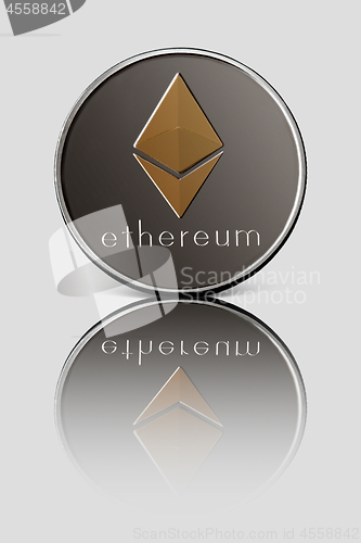 Image of Silver coin ethereum presented on a white glossy background