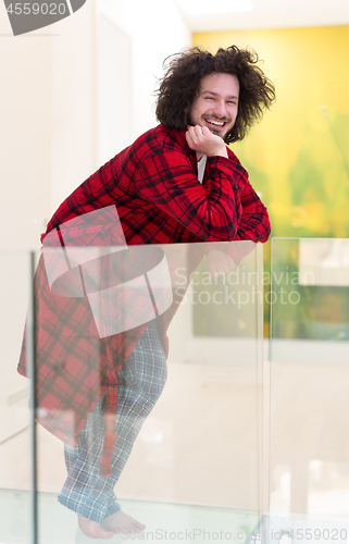 Image of portrait of young man in bathrobe