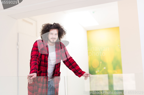 Image of portrait of young man in bathrobe