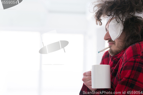 Image of young Man with flu and fever