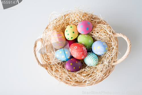 Image of colored easter eggs in basket