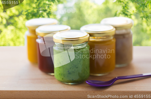 Image of vegetable or fruit puree or baby food in jars