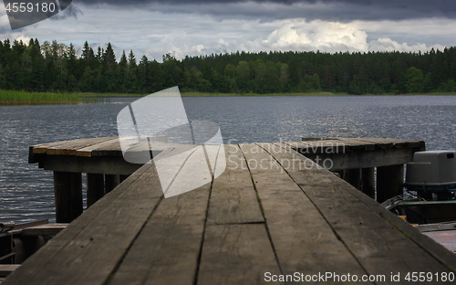 Image of View Of The Forest Lake From A Wooden Pier