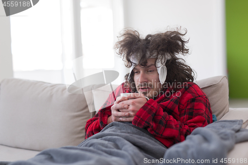 Image of young Man with flu and fever