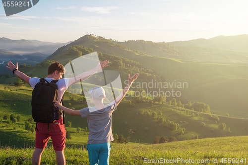 Image of Happy father and son in the Altai mountains