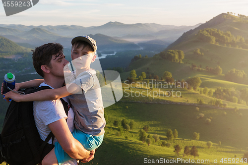 Image of Happy father and son in the Altai mountains