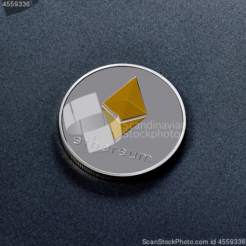 Image of One silver coin is ethereum on a black background. Worldwide Crypto-Currency