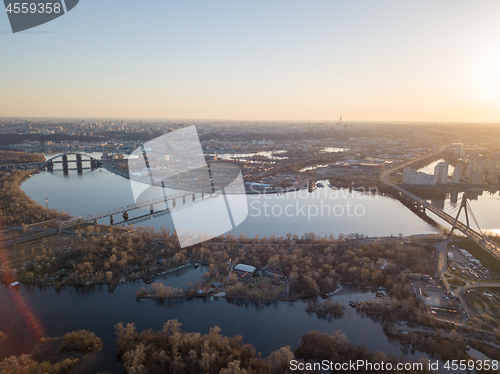 Image of Panoramic view of the city of Kiev and bridges and the Dnieper river at sunset