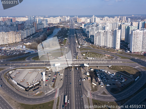 Image of A bird\'s eye view, aerial panoramic view from drone to the Kharkivskiy district of Kiev, Ukraine with highway, road junction and modern buildings.