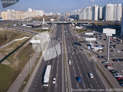 Image of Panoramic aerial view from drone Pozniaky district, Mykoly Bazhana Ave with traffic and modern building of the city Kiev Ukraine.
