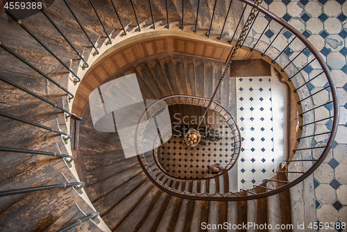 Image of Paris, France - August 05, 2006: Beautiful vintage high spiral staircase in the gallery of Vivienne. Top view