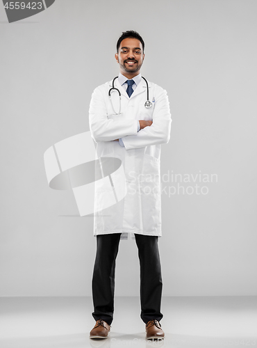 Image of smiling indian male doctor with stethoscope