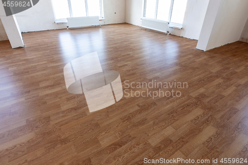 Image of Laminate flooring in the interior of a spacious room in a new building