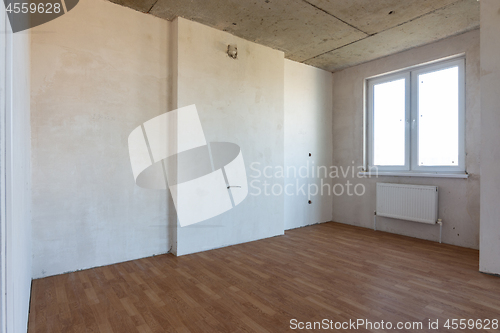 Image of Fragment of an interior in a new building, a room with a fine finish and a window