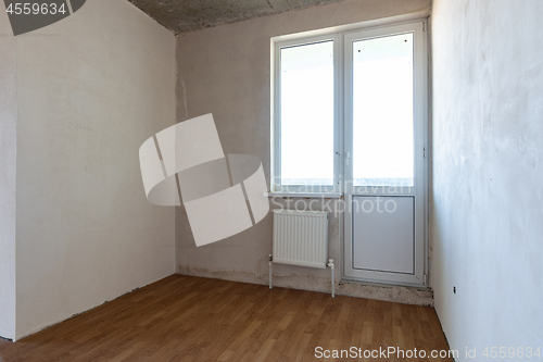 Image of Corner of the room with access to the balcony