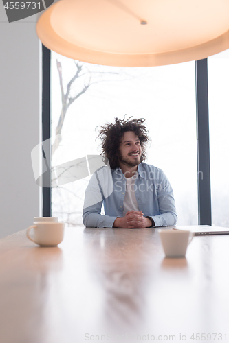 Image of Portrait of a young man at home