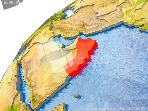 Image of Map of Oman in red on globe