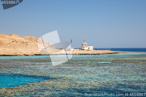 Image of Small island with coral reef