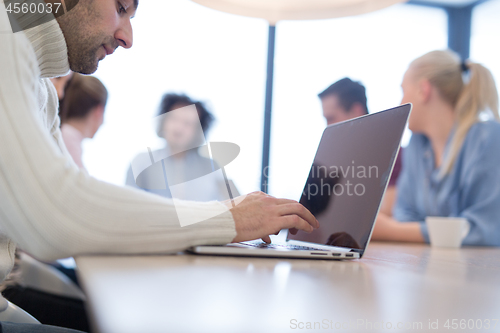 Image of Startup Business Team At A Meeting at modern office building