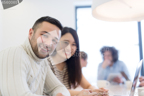 Image of Startup Business Team At A Meeting at modern office building