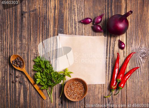 Image of Spices for cooking on a wooden table