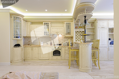 Image of Luxury modern beige and white kitchen interior