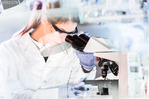 Image of Female health care researchers working in scientific laboratory.