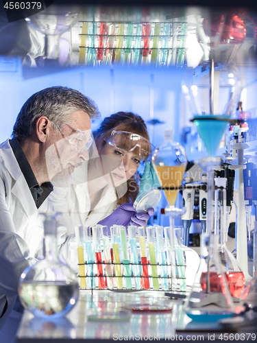 Image of Health care professionals researching in scientific laboratory.