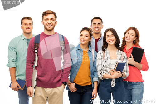 Image of group of smiling students with books