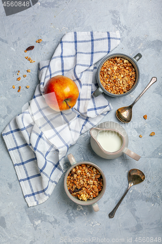 Image of Granola in bowls and a jug of milk for breakfast.