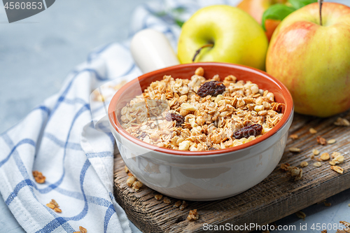 Image of Homemade granola with apples and raisins.
