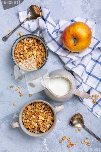 Image of Granola baked with apple. Healthy breakfast.