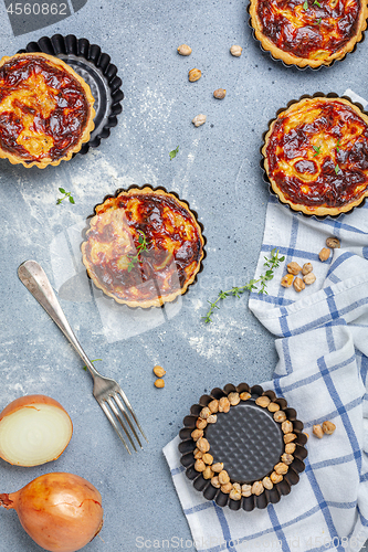 Image of Traditional homemade onion mini pies.