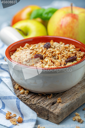 Image of Organic granola with raisins and apples.