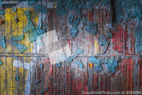 Image of Broken glass on wooden floor as background texture