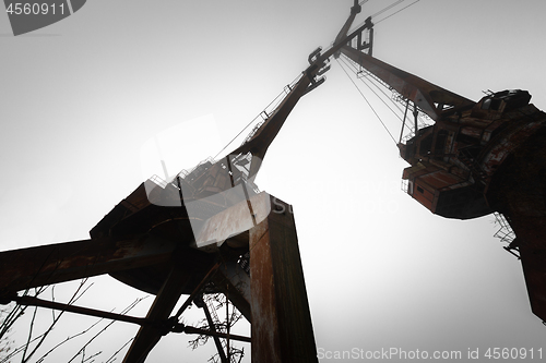 Image of Rusty old industrial dock cranes at Chernobyl Dock, 2019