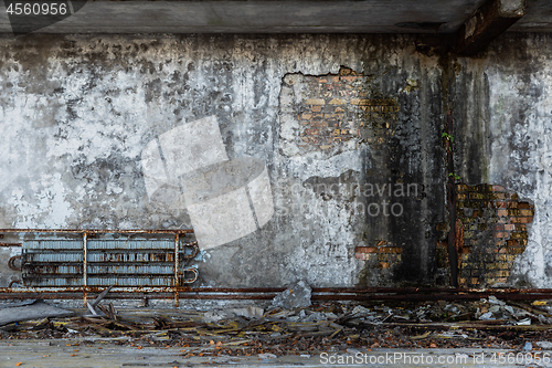 Image of Abandoned damaged building wall